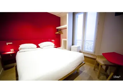 Un ou plusieurs lits dans un hébergement de l'établissement Hotel Andréa