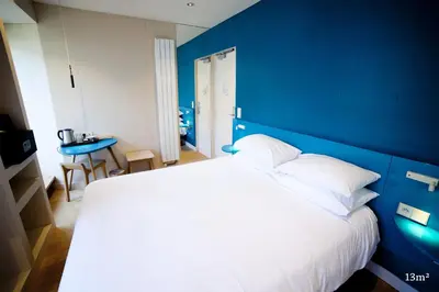 Un ou plusieurs lits dans un hébergement de l'établissement Hotel Andréa
