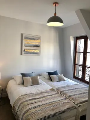 Un ou plusieurs lits dans un hébergement de l'établissement Appartement cœur de la bastille