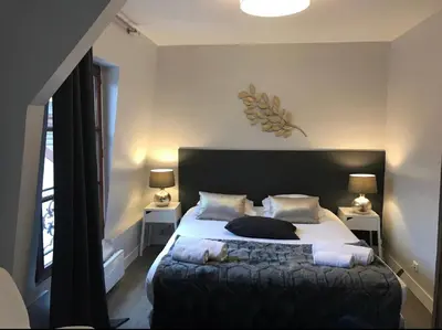 Un ou plusieurs lits dans un hébergement de l'établissement Appartement cœur de la bastille