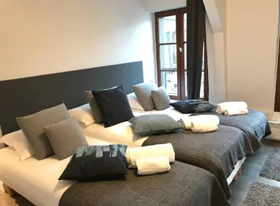 Un ou plusieurs lits dans un hébergement de l'établissement Appartement cœur de la bastille