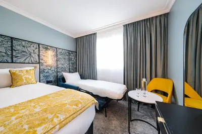 Un ou plusieurs lits dans un hébergement de l'établissement voco Paris Montparnasse by IHG