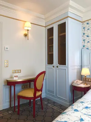 Un ou plusieurs lits dans un hébergement de l'établissement Hôtel Mayfair Paris