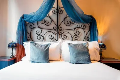 Un ou plusieurs lits dans un hébergement de l'établissement Villa Royale Montsouris