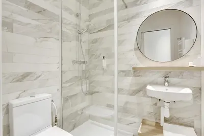 Salle de bains dans l'établissement Hotel Courseine