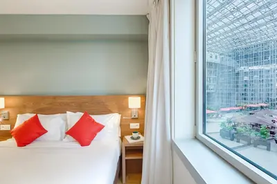 Un ou plusieurs lits dans un hébergement de l'établissement Citadines Place d'Italie Paris