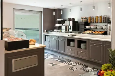 Cuisine ou kitchenette dans l'établissement Citadines Place d'Italie Paris