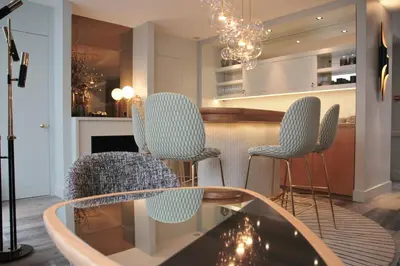 Coin salon dans l'établissement Millésime Hôtel