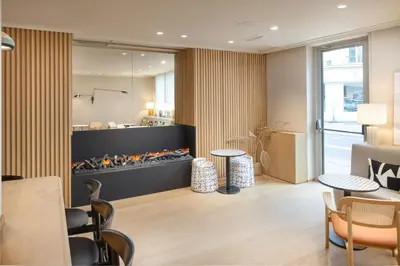 Coin salon dans l'établissement Residence Inn by Marriott Paris Didot Montparnasse
