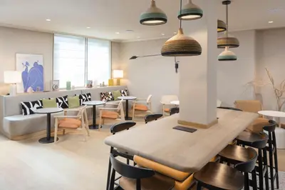 Coin salon dans l'établissement Residence Inn by Marriott Paris Didot Montparnasse