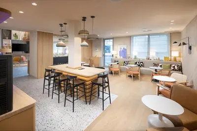 Télévision ou salle de divertissement dans l'établissement Residence Inn by Marriott Paris Didot Montparnasse