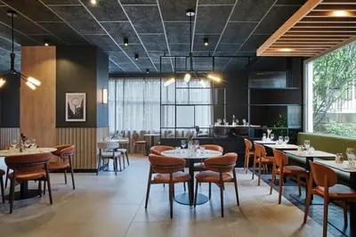 Coin salon dans l'établissement Campanile PRIME - Paris Porte d'Italie
