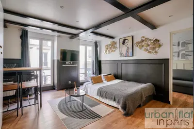 Un ou plusieurs lits dans un hébergement de l'établissement 13 Luxury Flat eiffel design 2