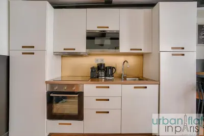 Cuisine ou kitchenette dans l'établissement 13 Luxury Flat eiffel design 2