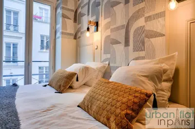 Un ou plusieurs lits dans un hébergement de l'établissement 13 Luxury Flat eiffel design 2