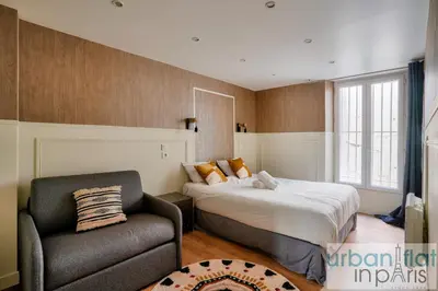 Un ou plusieurs lits dans un hébergement de l'établissement 13 Luxury Flat eiffel design 2