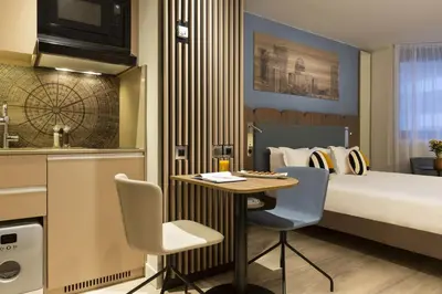 Cuisine ou kitchenette dans l'établissement Citadines La Défense Paris