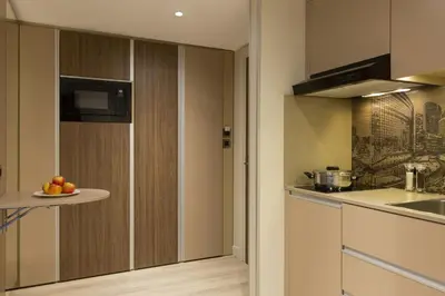 Cuisine ou kitchenette dans l'établissement Citadines La Défense Paris