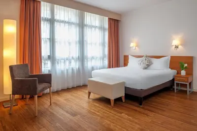 Un ou plusieurs lits dans un hébergement de l'établissement Citadines Saint-Germain-des-Prés Paris