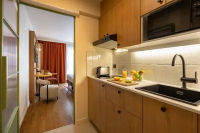 Cuisine ou kitchenette dans l'établissement Citadines République Paris