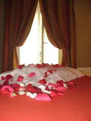 Un ou plusieurs lits dans un hébergement de l'établissement Hotel Eden Montmartre
