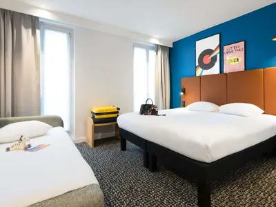 Un ou plusieurs lits dans un hébergement de l'établissement ibis Paris Gare du Nord TGV