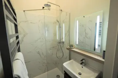 Salle de bains dans l'établissement Richelieu ChicSuites