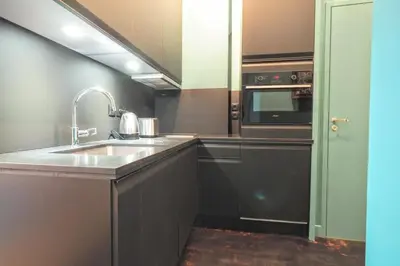 Cuisine ou kitchenette dans l'établissement Richelieu ChicSuites
