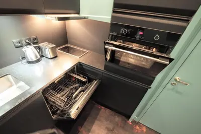 Cuisine ou kitchenette dans l'établissement Richelieu ChicSuites