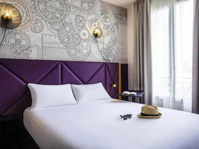Un ou plusieurs lits dans un hébergement de l'établissement ibis Styles Paris Mairie De Clichy