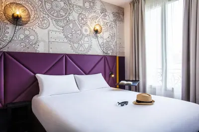 Un ou plusieurs lits dans un hébergement de l'établissement ibis Styles Paris Mairie De Clichy