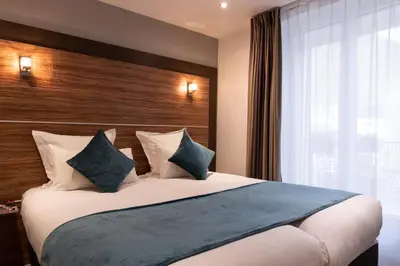 Un ou plusieurs lits dans un hébergement de l'établissement Hotel Apolonia Paris Montmartre; Sure Hotel Collection by Best Western