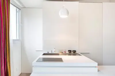 Cuisine ou kitchenette dans l'établissement Modern Apartment in the Heart of the Marais