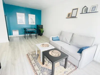 Coin salon dans l'établissement Cosy appart proche Paris