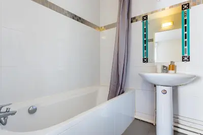 Salle de bains dans l'établissement Cosy appart proche Paris