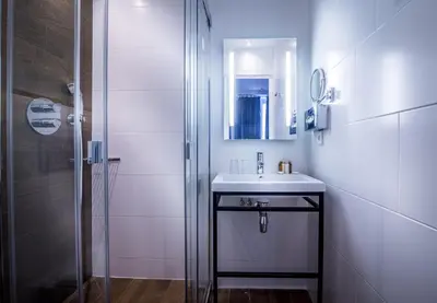 Salle de bains dans l'établissement Hotel Marais Grands Boulevards
