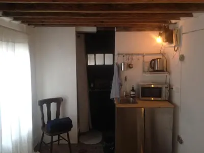 Cuisine ou kitchenette dans l'établissement Studio Romantique et Boheme