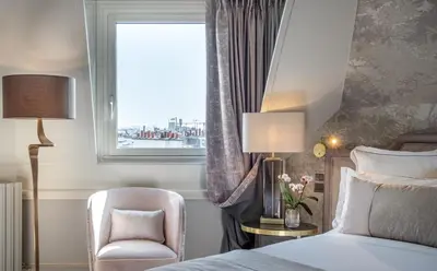 Un ou plusieurs lits dans un hébergement de l'établissement Hôtel Elysia by Inwood Hotels