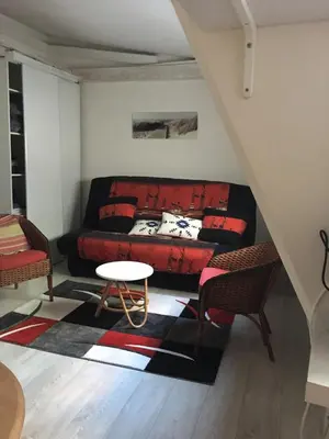 Coin salon dans l'établissement Cosy Holidays Room