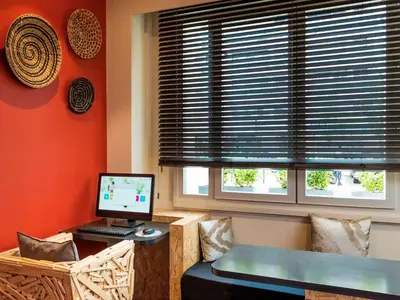 Télévision ou salle de divertissement dans l'établissement ibis Styles Paris Boulogne Marcel Sembat