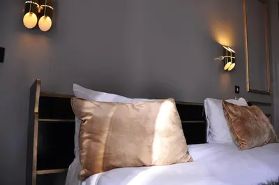 Un ou plusieurs lits dans un hébergement de l'établissement Alba Opéra Hôtel