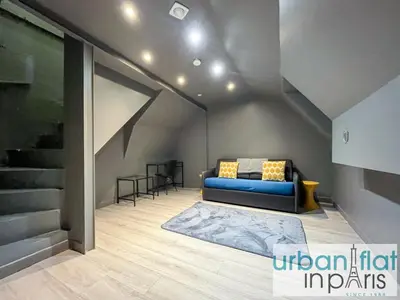 Un ou plusieurs lits dans un hébergement de l'établissement 05 - Parisian Design Loft