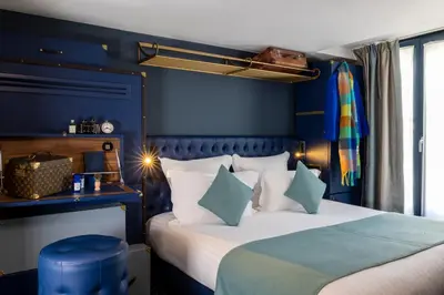 Un ou plusieurs lits dans un hébergement de l'établissement Hotel Whistler - Gare du Nord