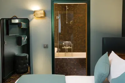 Un ou plusieurs lits dans un hébergement de l'établissement Hotel Whistler - Gare du Nord