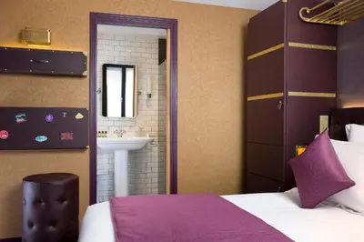 Un ou plusieurs lits dans un hébergement de l'établissement Hotel Whistler - Gare du Nord