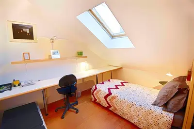Un ou plusieurs lits dans un hébergement de l'établissement Paris-Oasis Montmartre