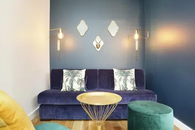 Coin salon dans l'établissement Rent a Room - Charon 3
