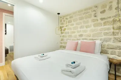 Un ou plusieurs lits dans un hébergement de l'établissement Rent a Room - Charon 3