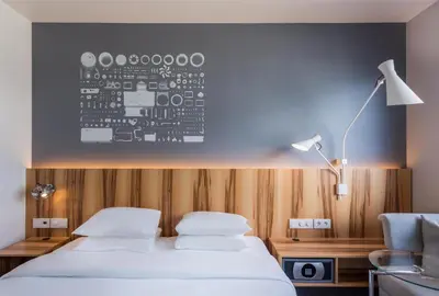Un ou plusieurs lits dans un hébergement de l'établissement Hyatt Regency Paris Etoile
