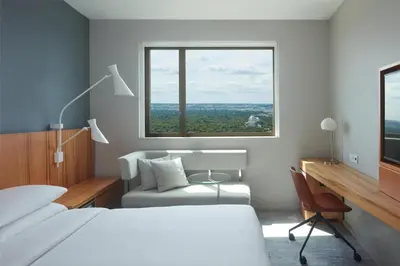 Un ou plusieurs lits dans un hébergement de l'établissement Hyatt Regency Paris Etoile